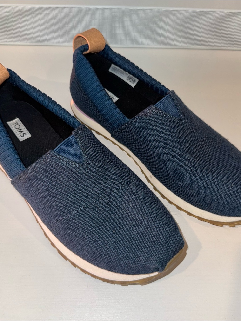 Toms  Women's Navy Blue Canvas Slip-On Loafers with Tan Heel Tab